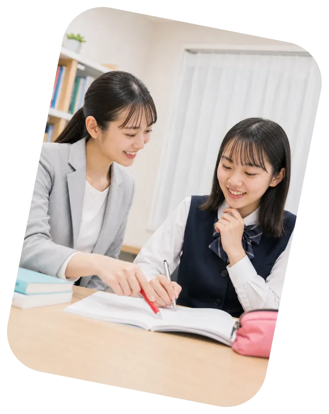 先生と生徒が並んで学習する様子